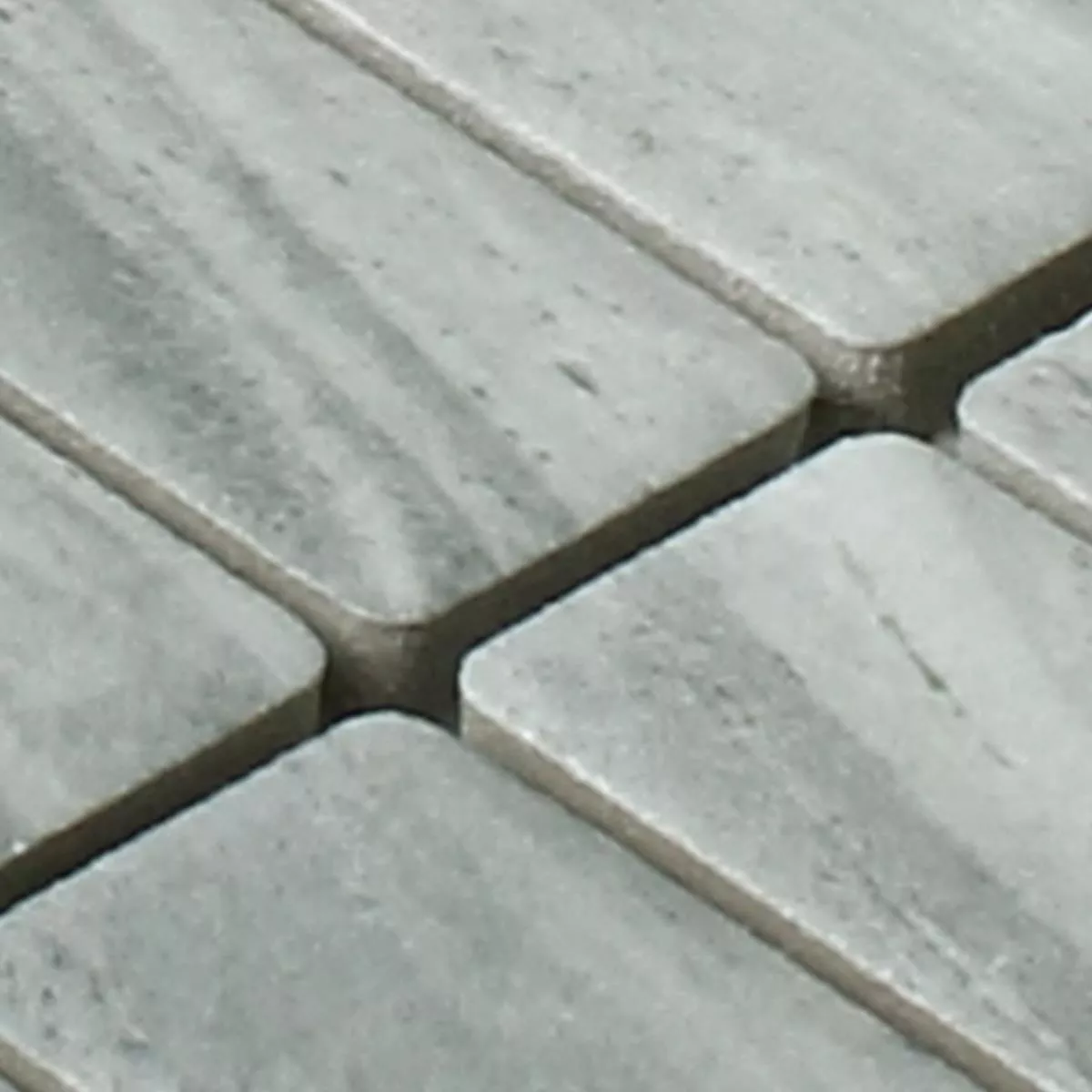Muster von Mosaikfliesen Keramik Steinoptik Chorol Grau